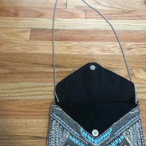 POSH MARK beaded clutch